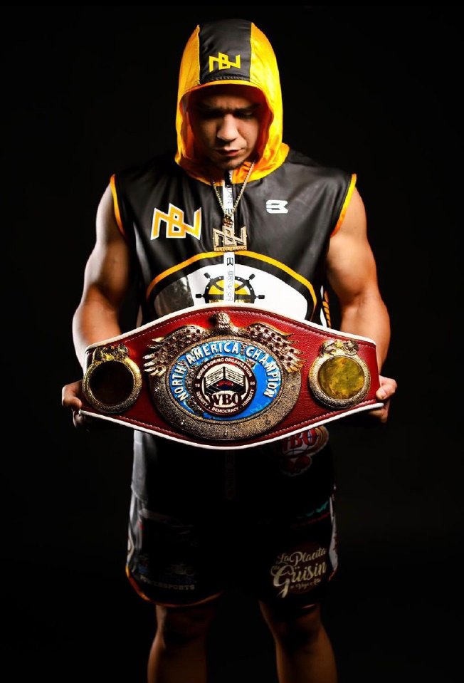 Nestor Bravo with the WBA Continental belt over his shoulder